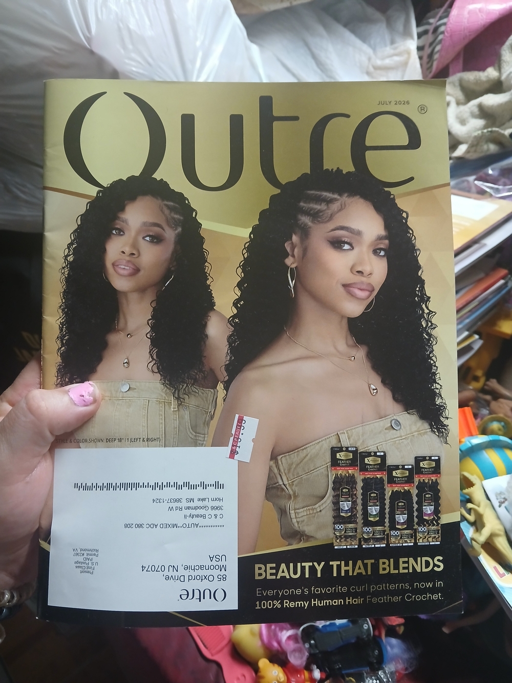 Outré hair catalog from July 2026 showcasing their 100% Remy Human Hair Feather